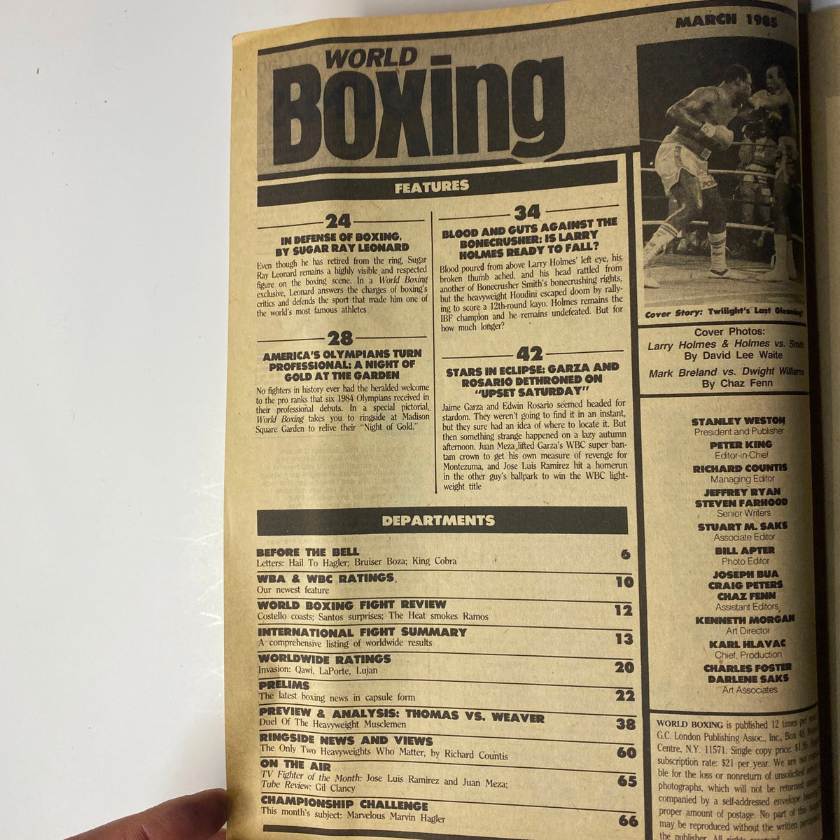 Inside page of World Boxing Magazine March 1985 detailing features and departments, including coverage of Larry Holmes and Pinklon Thomas.