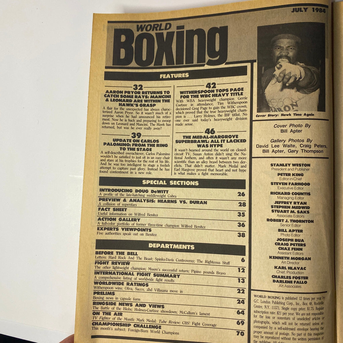 Contents page of World Boxing Magazine July 1984 detailing features on Aaron Pryor and Larry Holmes, including updates on professional boxers and upcoming matches.