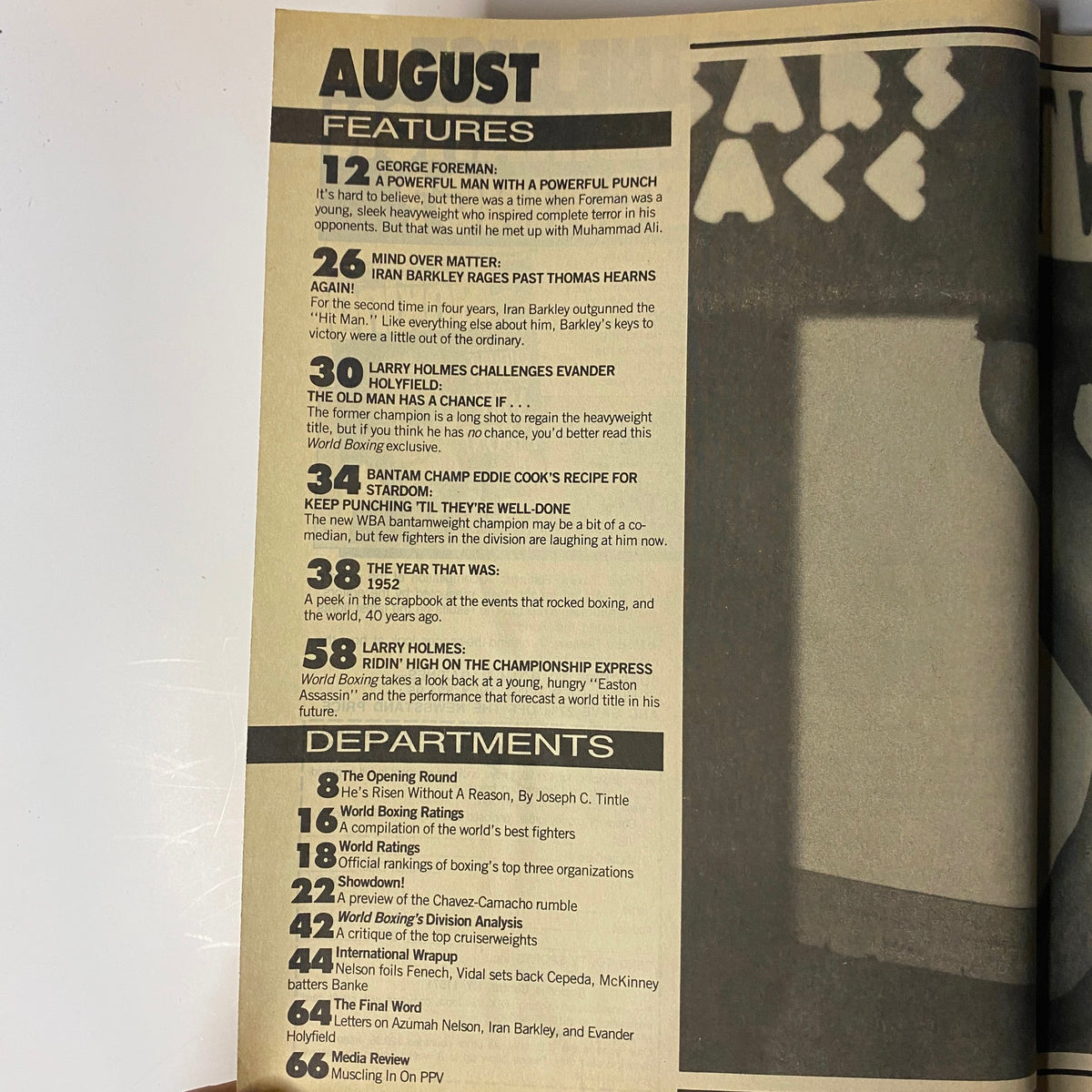 Table of contents from World Boxing Magazine August 1992, featuring articles on Evander Holyfield vs. Larry Holmes, George Foreman's legacy, and Iran Barkley's victory over Thomas Hearns.