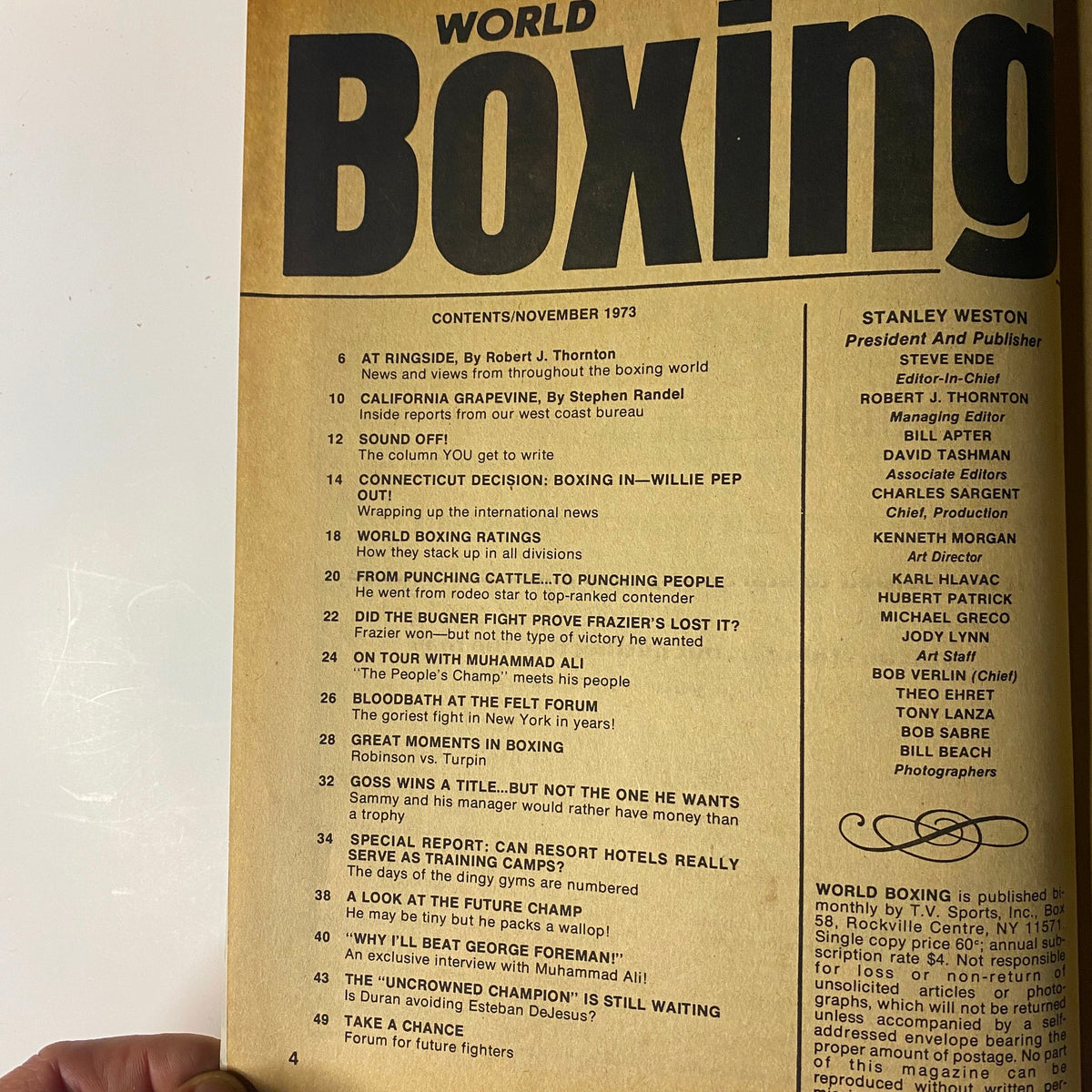 Contents page of World Boxing Magazine, November 1973, listing articles such as 'At Ringside', 'California Grapevine', and 'Sound Off!'. The magazine features notable pieces on Muhammad Ali's boxing career and insights from the era.
