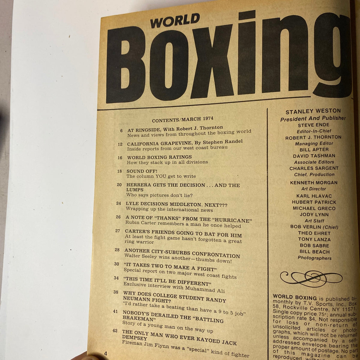Inside page of World Boxing Magazine March 1974, outlining the contents including articles on boxing events and fighters, showcasing the magazine's valuable insights into the sport's history and contemporary coverage.