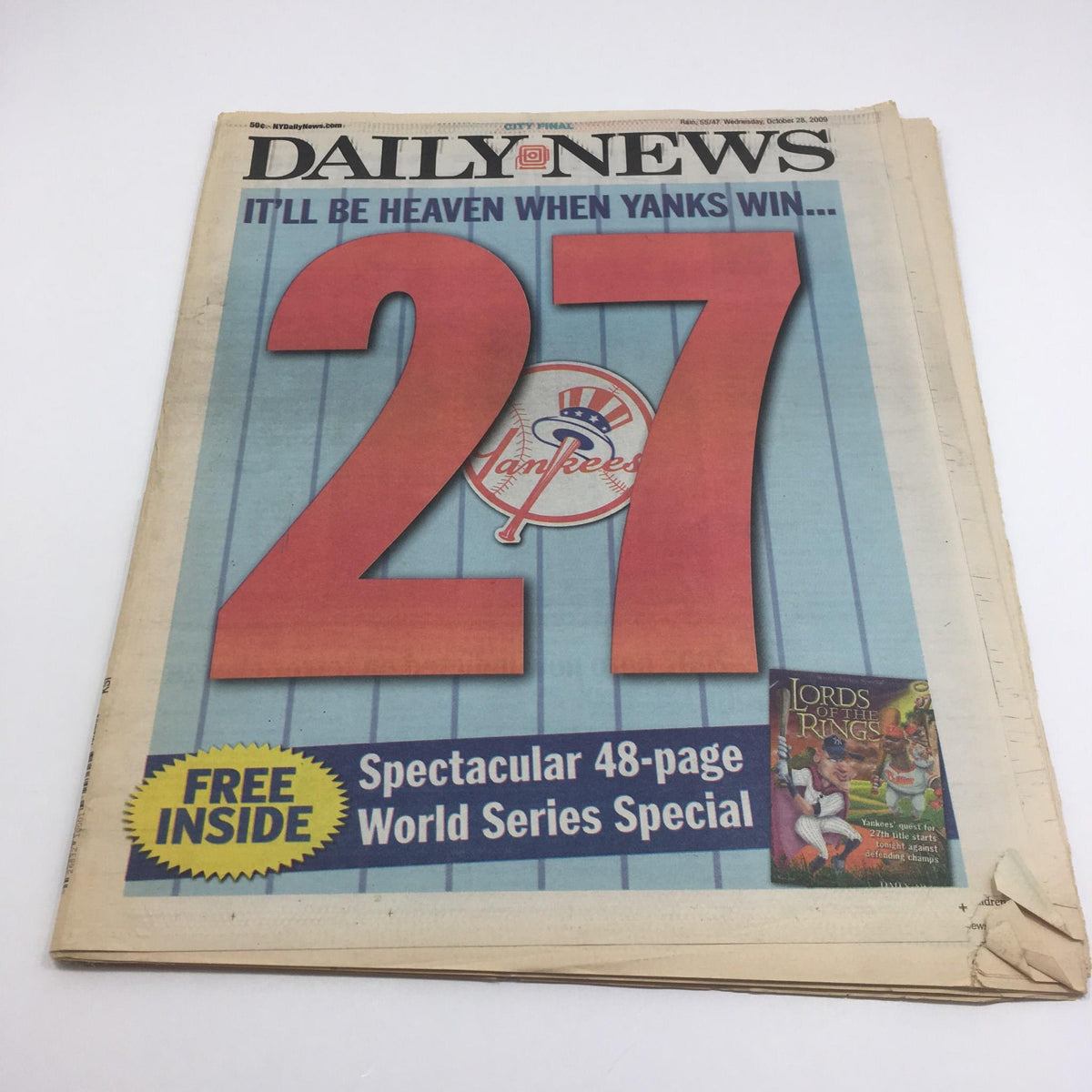 Cover of NY Daily News from October 28, 2009, featuring the headline 'It'll Be Heaven When Yanks Win 27' with a prominent '27' and Yankees logo.