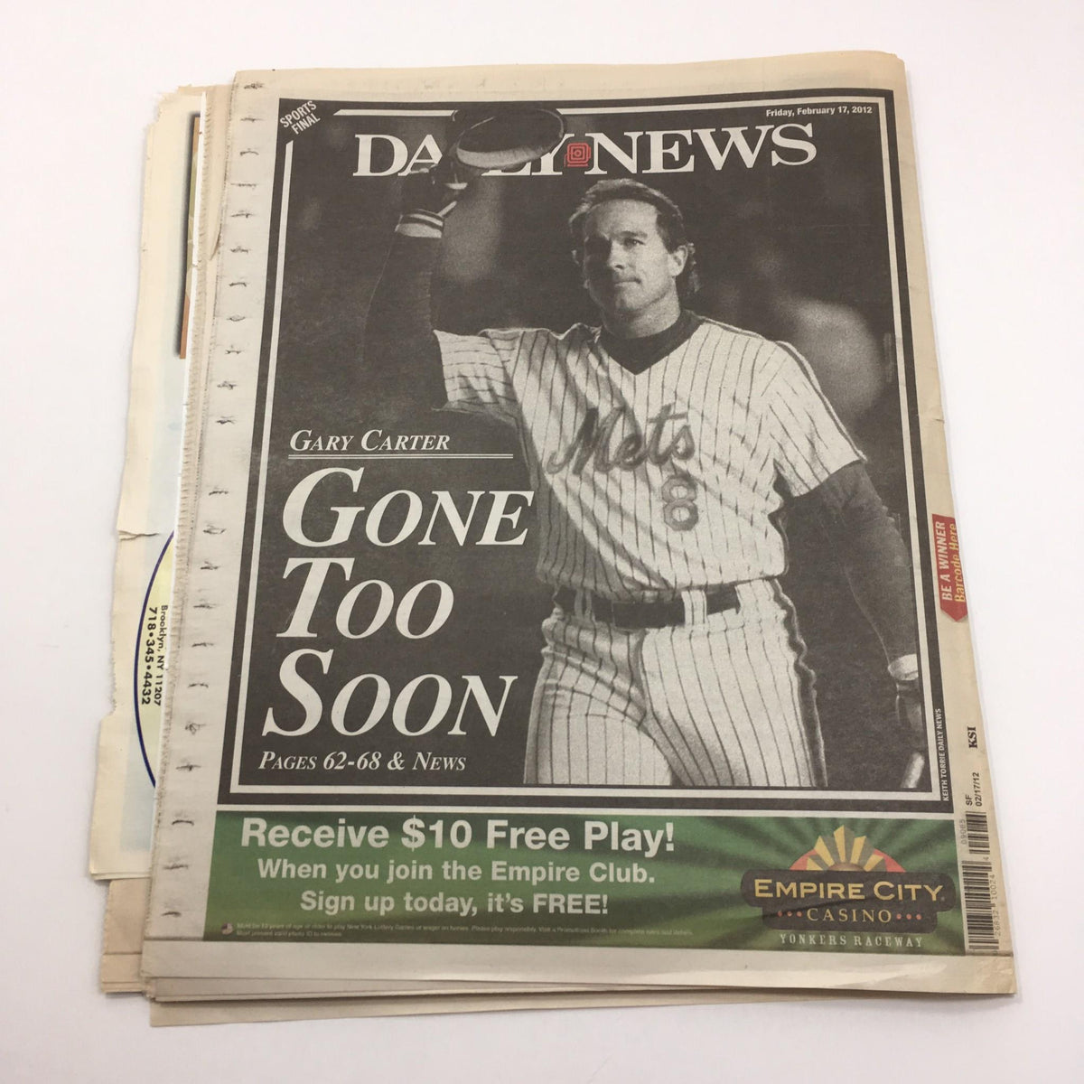 New York Daily News front page from February 17, 2012, featuring Gary Carter with the headline 'Gone Too Soon.' This collector's edition commemorates the baseball legend, showcasing his impact on the sport. Pages 62-68 & News included.