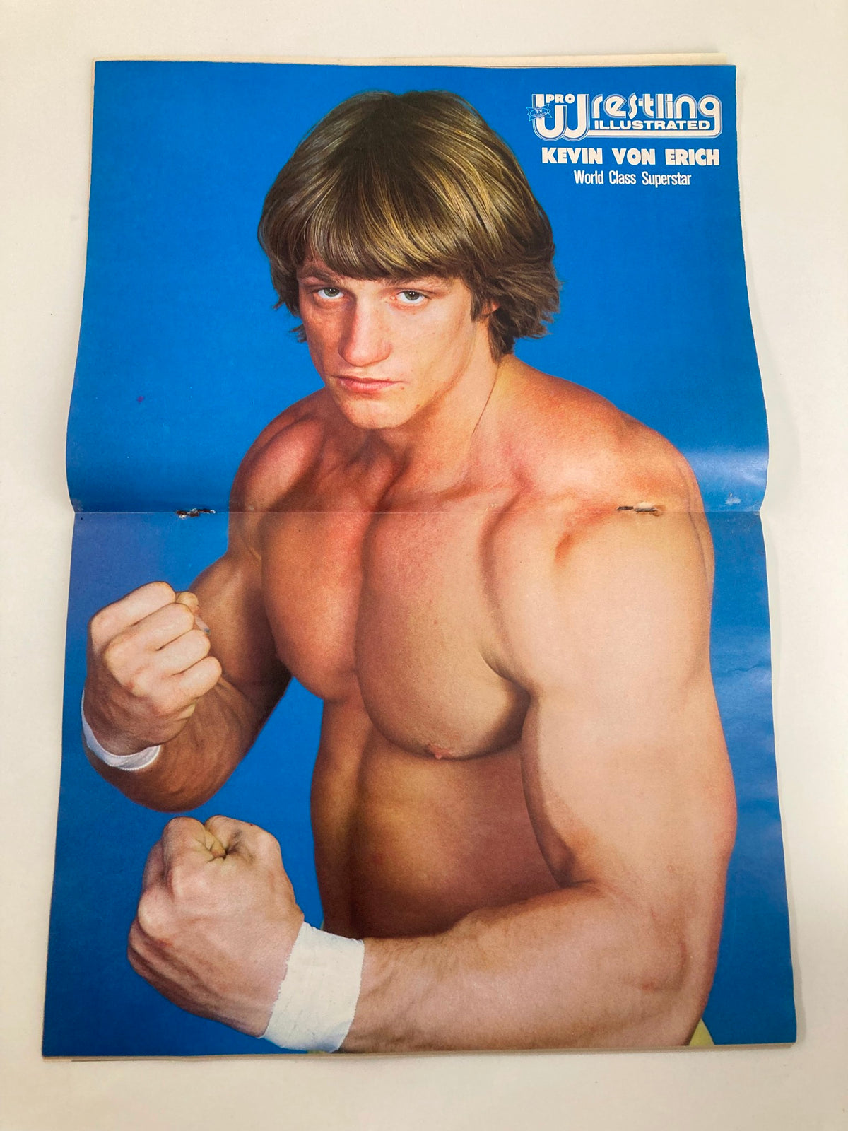 Pro Wrestling Illustrated magazine featuring Kevin Von Erich on the cover, showcasing him as a World Class Superstar with a vibrant blue background.