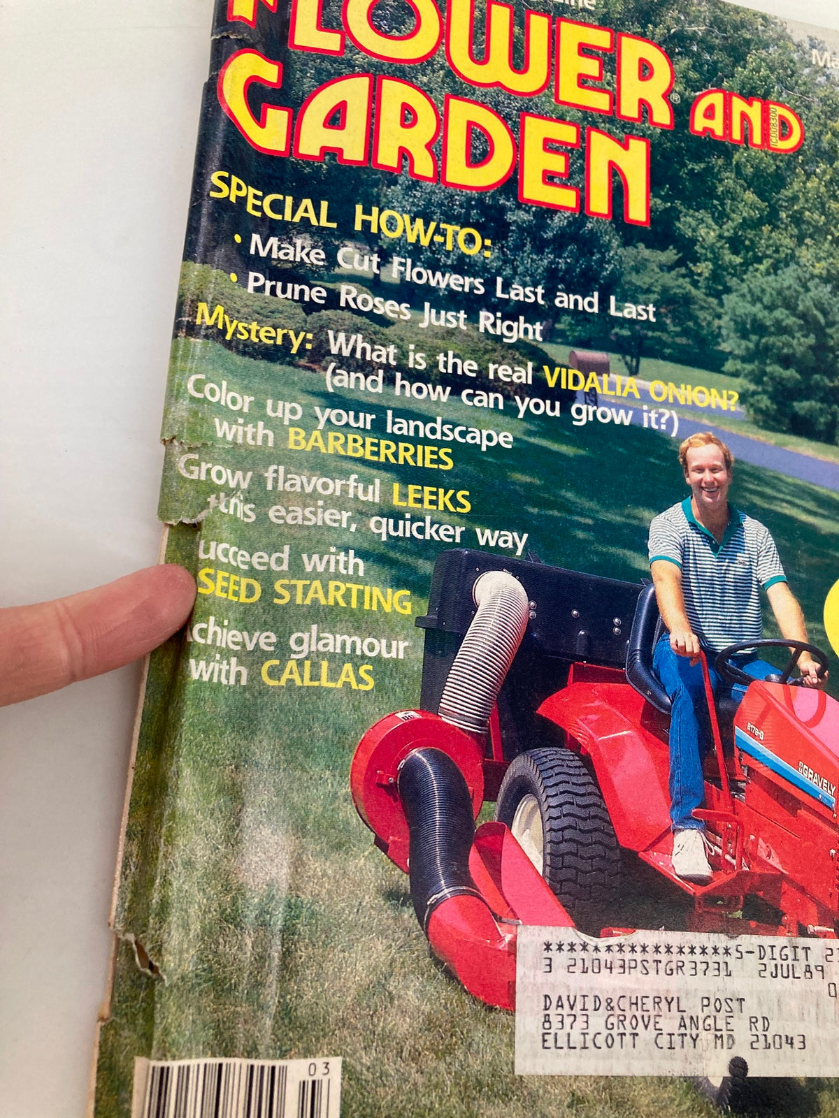 Close-up of the cover of the Vintage Flower and Garden Magazine from March 1987, highlighting special gardening tips, including sections on how to prune roses, grow leeks, and successfully start seeds.