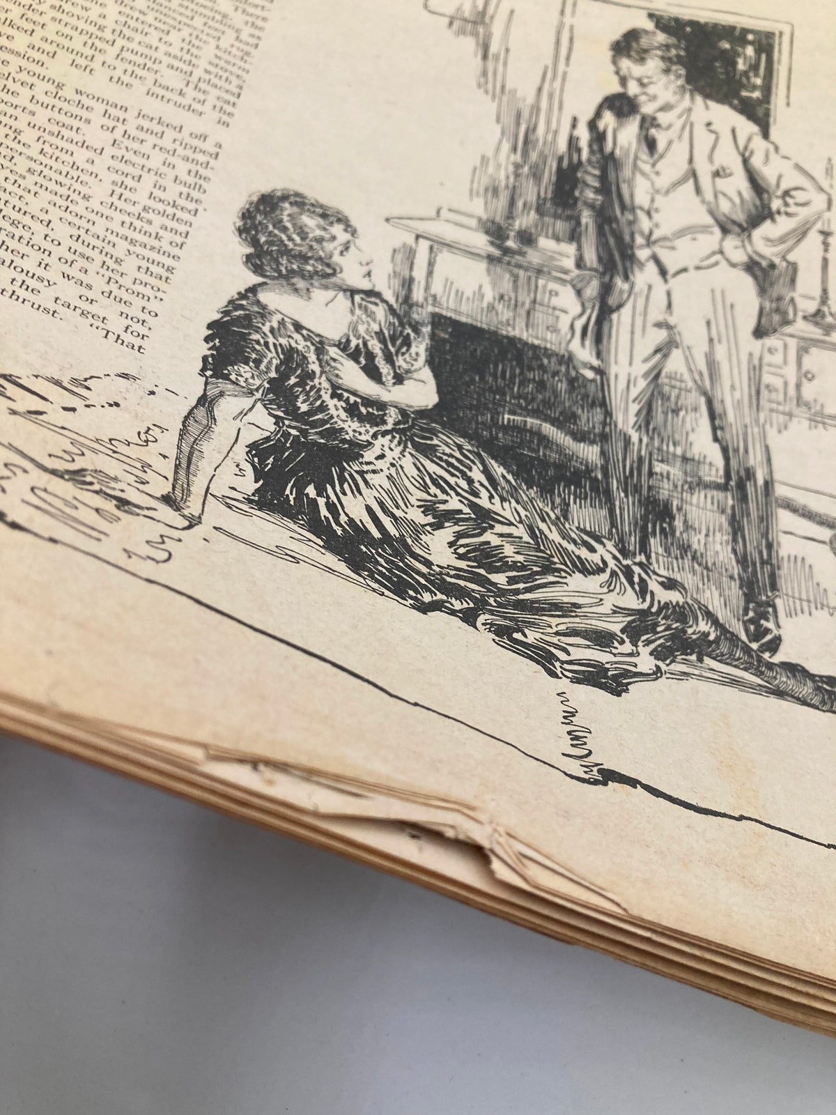 Close-up view of a page from VTG The Farmer's Wife Magazine October 1925, illustrating the story 'The Seventh Baby' with detailed artwork and visible wear, reflecting its vintage condition.