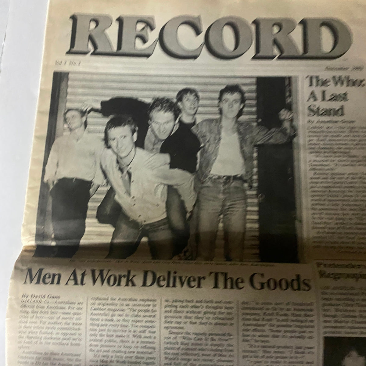 Inside page of VTG Record Magazine December 1982, Vol 2 No 2, featuring an article titled 'The Who, A Last Stand' and a feature on Men At Work, highlighting significant rock music events.