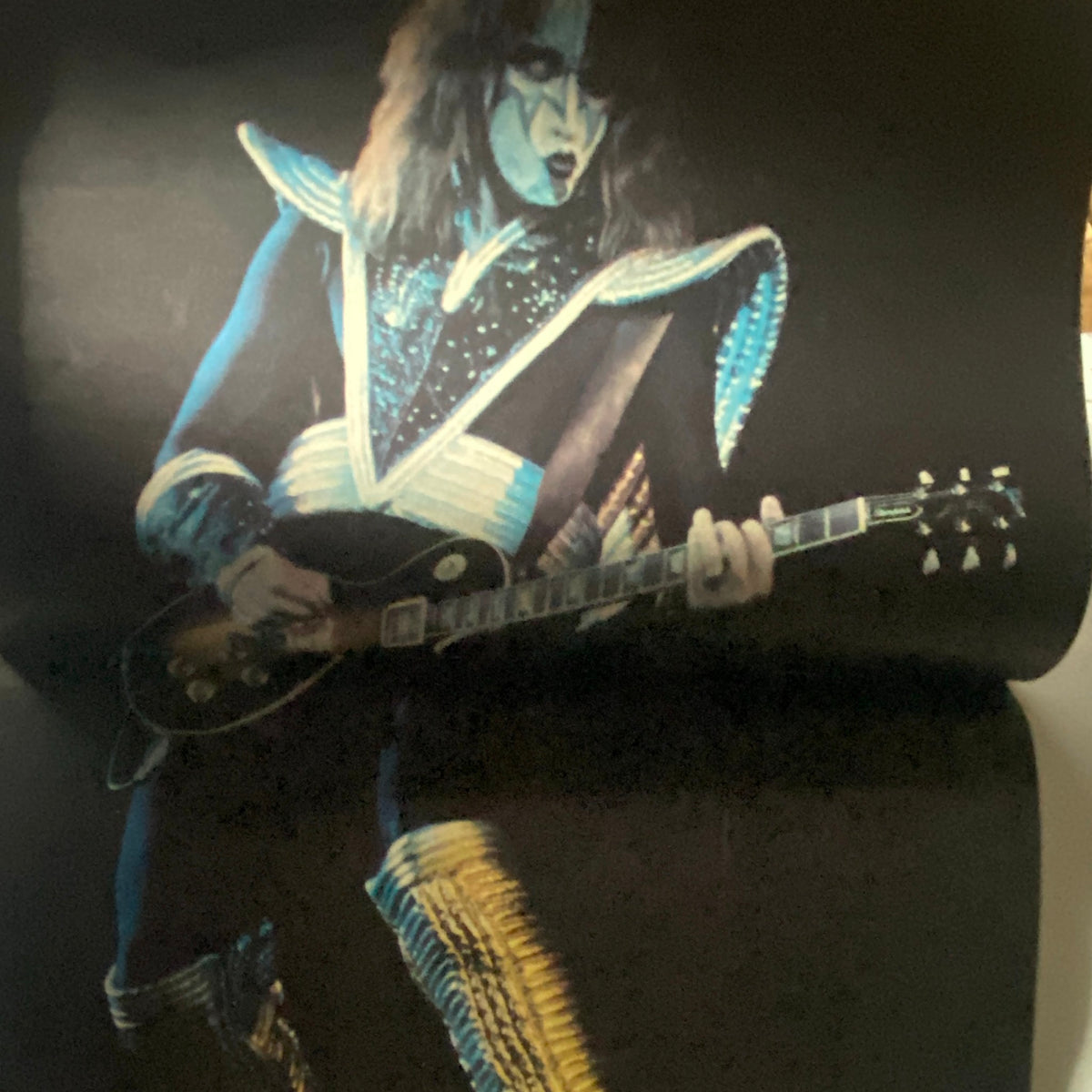 Page from VTG Hit Parader Magazine July 1977 highlighting a vibrant image of a guitarist in a striking costume, representing the iconic Kiss band.