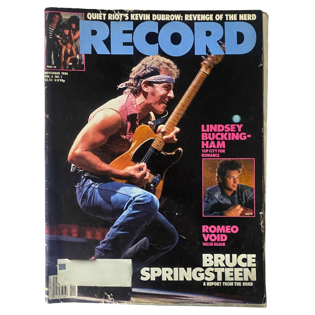 Cover of VTG Record Magazine November 1984 Vol 4 No. 1 featuring Bruce Springsteen, with article highlights including Lindsey Buckingham and Romeo Void. A vibrant snapshot of the 1980s music scene.