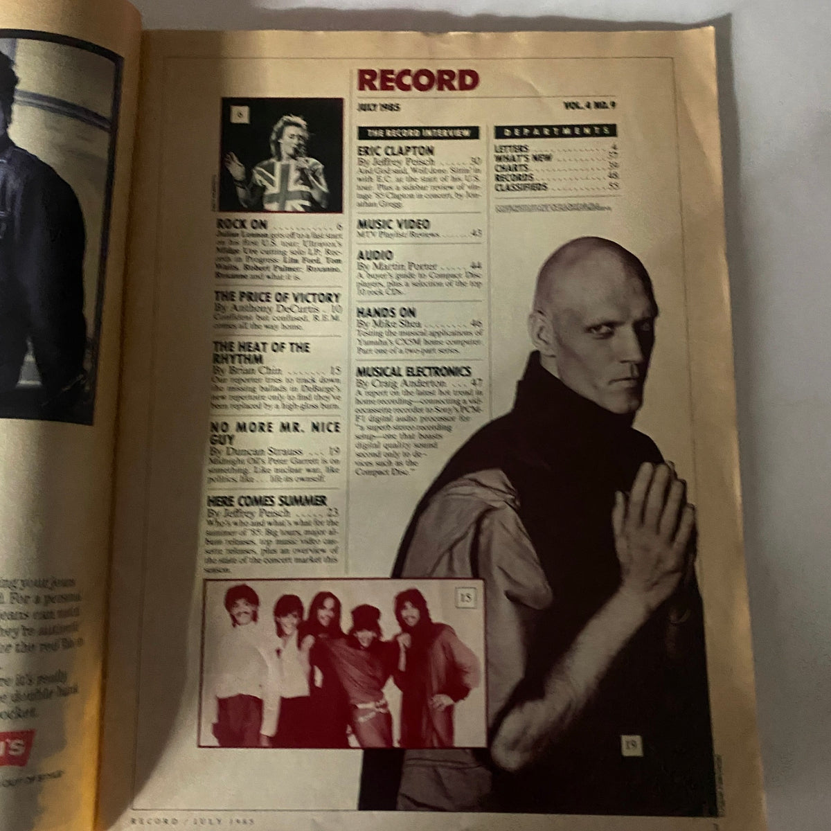 Inside pages of VTG Record Magazine July 1985, Volume 4 No. 9, listing articles including the Eric Clapton interview and other music content from the mid-1980s.