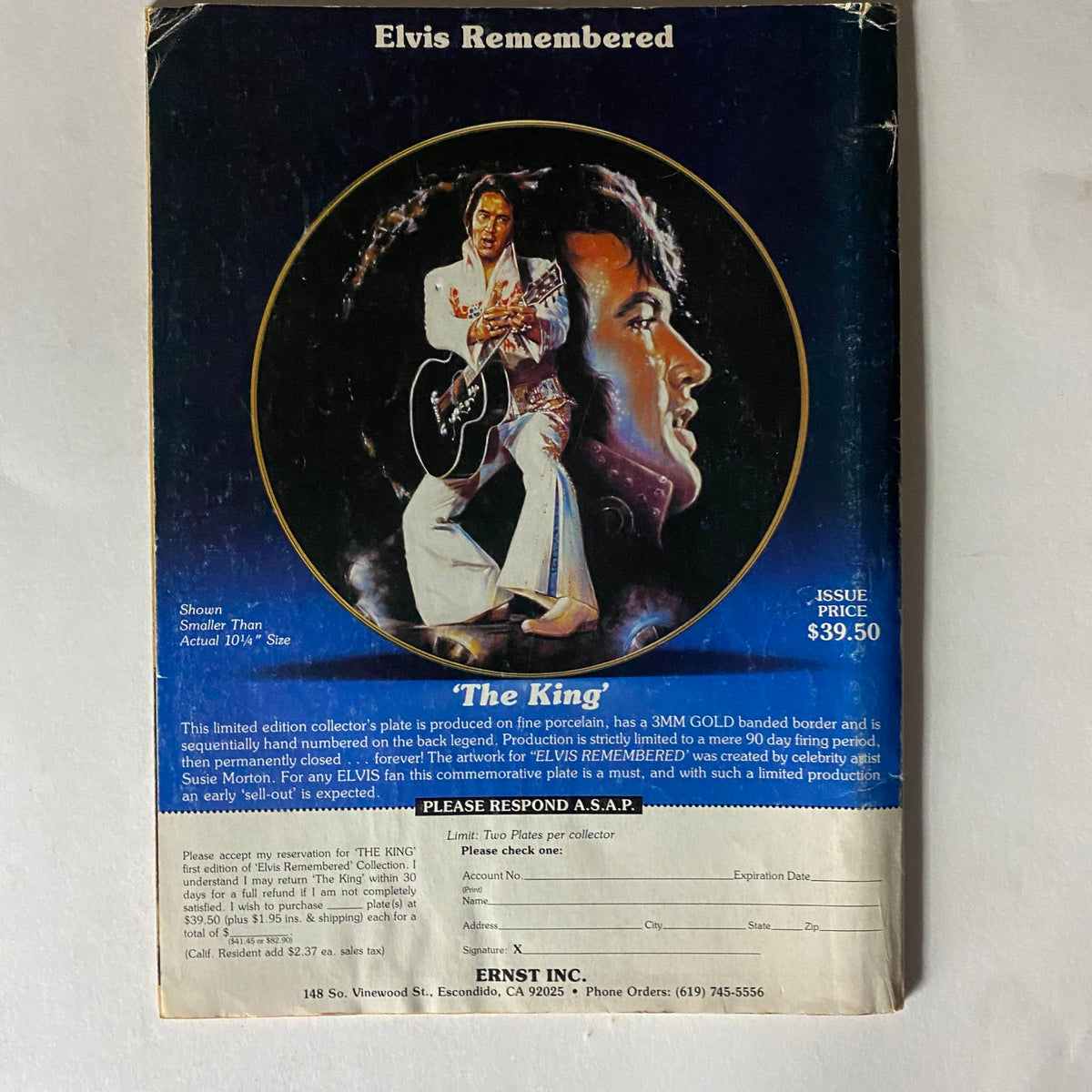 VTG Rock Stars Present 1987 Elvis Presley His Life, Films, Music No Label showcasing the back cover of a magazine titled 'Elvis Remembered', featuring Elvis as 'The King' with a price of $39.50.
