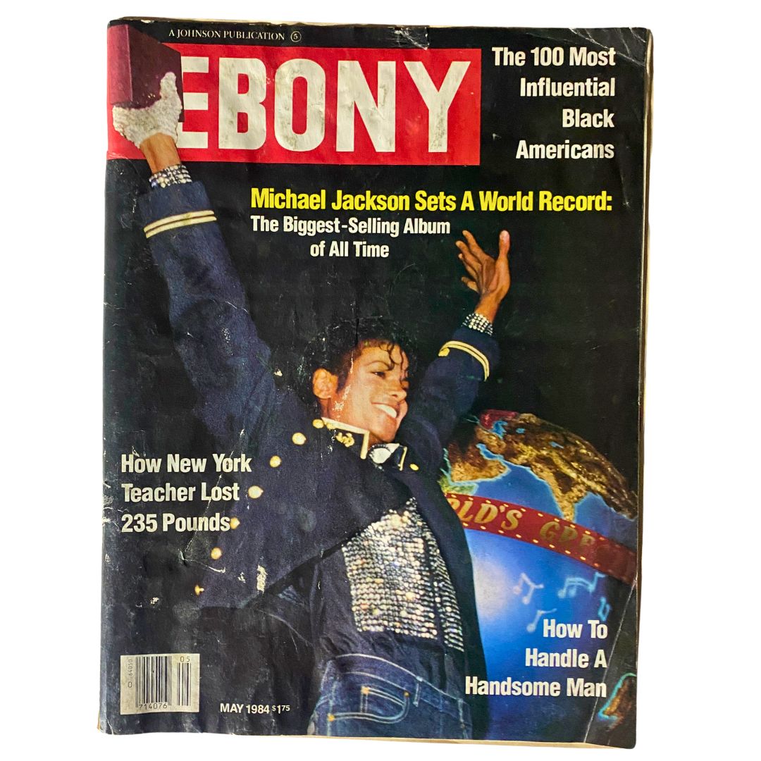 VTG Ebony Magazine May 1984 featuring Michael Jackson on the cover, celebrating his record-breaking album sales with a vibrant image and bold headlines.