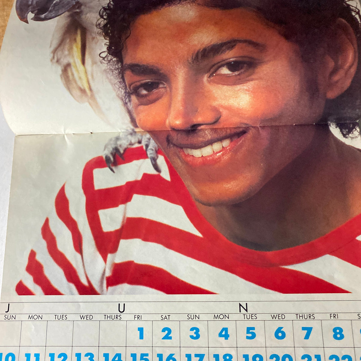 VTG Right On Magazine 1984-1985 featuring Michael Jackson with a parrot, highlighting his playful side on the June calendar page.