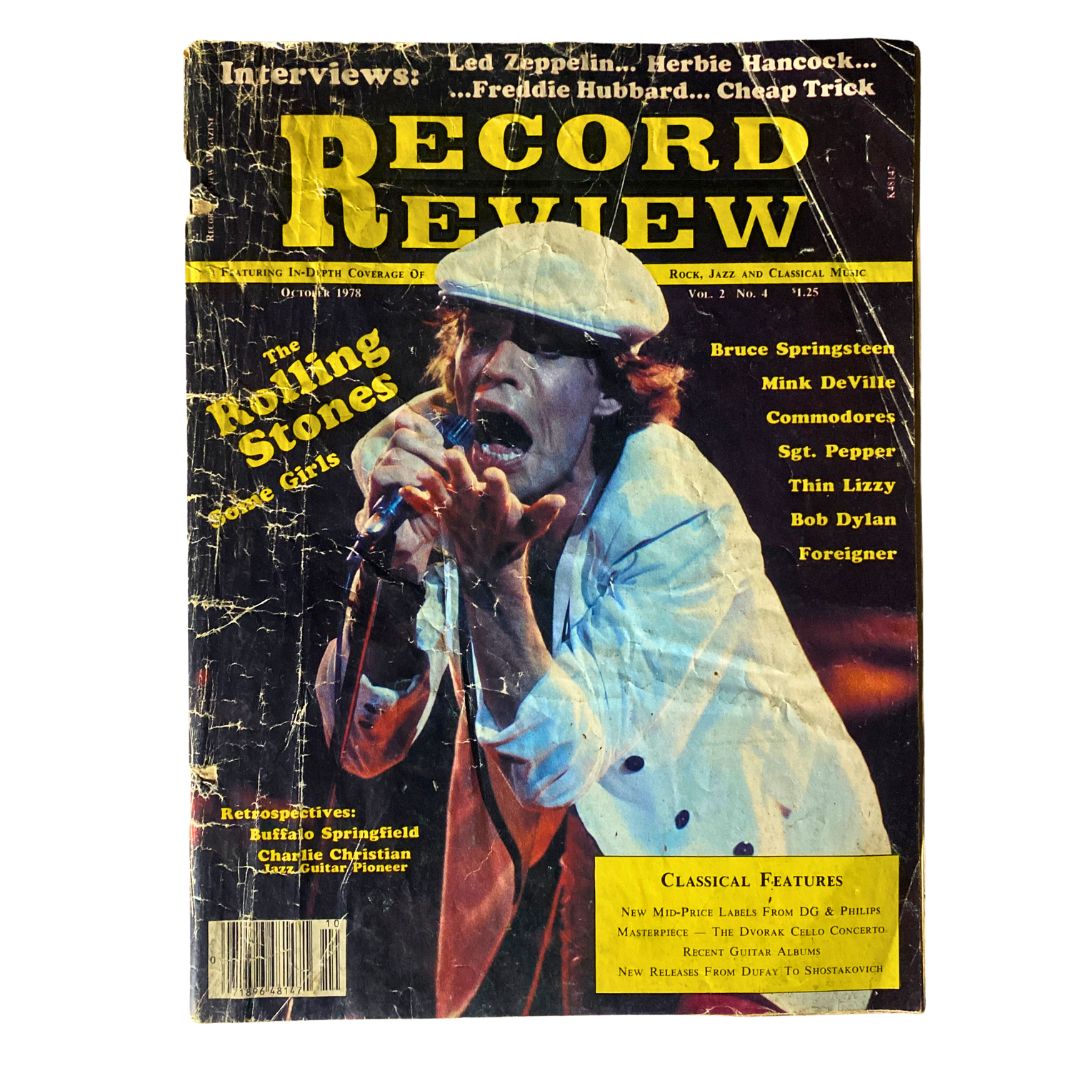 Cover of the VTG Record Review Magazine from October 1978 featuring Mick Jagger of The Rolling Stones, showcasing the title 'Record Review' in bold yellow letters. The magazine includes references to interviews with iconic musicians and highlights the music scene of the late 70s.