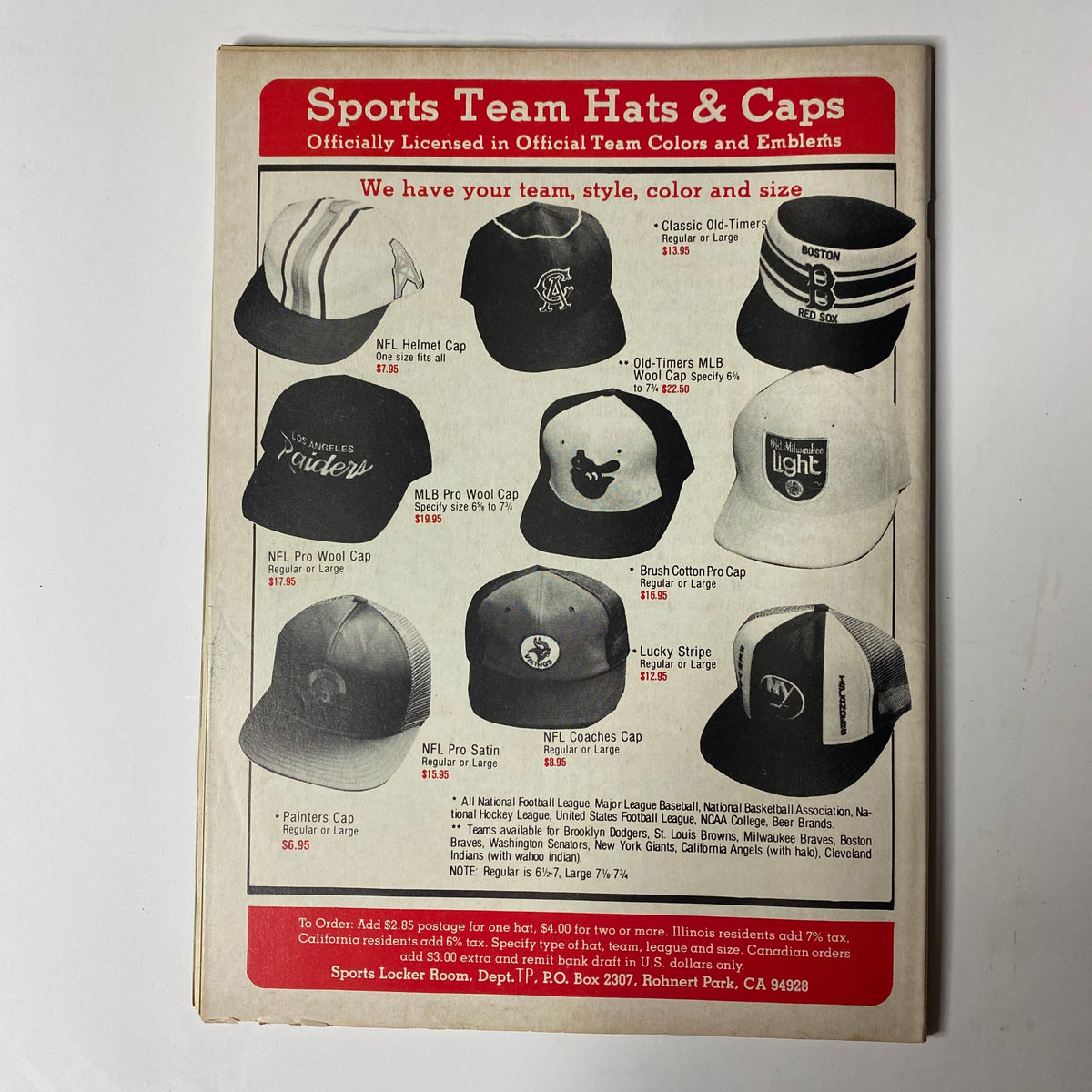 Back cover of Boxing Scene Magazine January 1991 featuring various Sports Team Hats and Caps available for order, showcasing officially licensed team colors and emblems.
