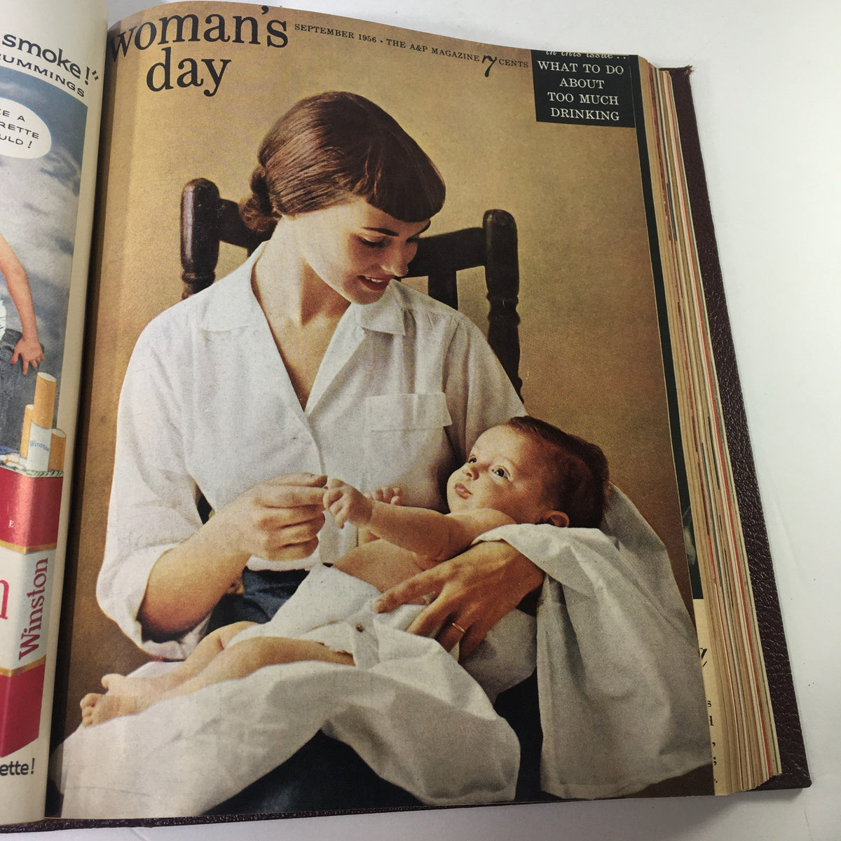 September 1956 Woman's Day Magazine cover showing a mother with her baby, emphasizing parenting themes in the complete year round compilation.