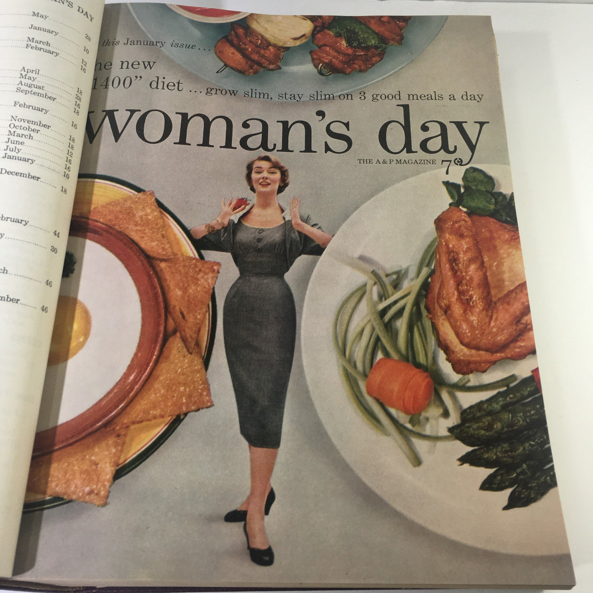 Interior page of the 1954 Woman's Day Magazine featuring a fashionable woman presenting a healthy meal, illustrating mid-century culinary trends and lifestyle as part of the complete year round compilation.