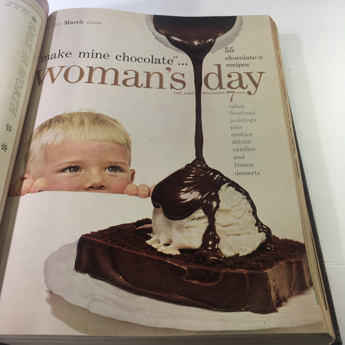Cover of the 1954 Woman's Day Magazine showcasing chocolate recipes with a child eagerly looking at a dessert.