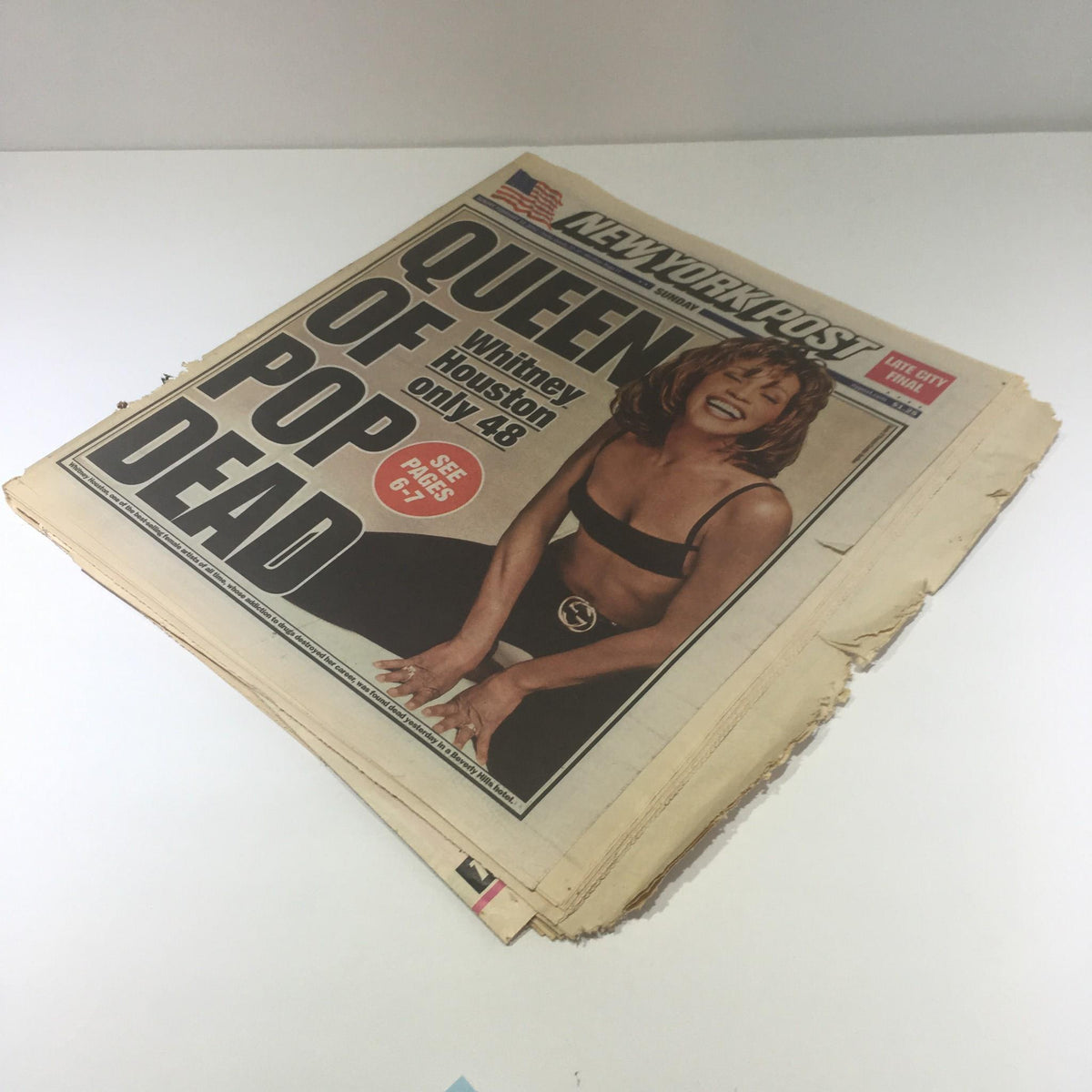 New York Post: Feb 12 2012, Queen of Pop Dead - Front page of the newspaper announcing Whitney Houston's death with the headline 'Queen of Pop Dead at 48'.