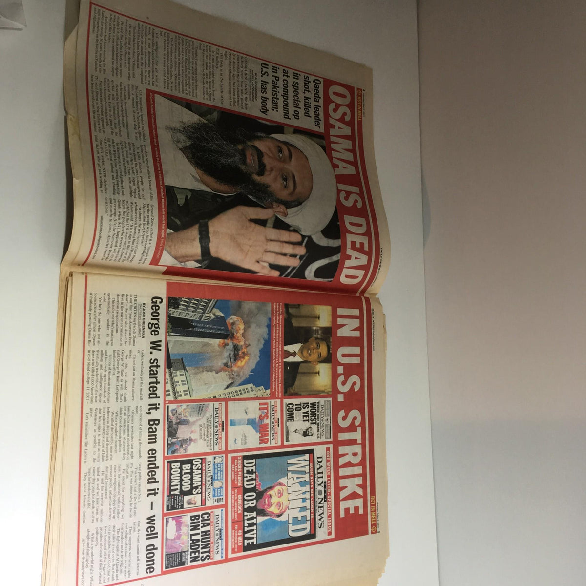 Another view of the inside spread from the NY Daily News, May 2, 2011, emphasizing the statement 'OSAMA IS DEAD' and reflecting on the U.S. military action.