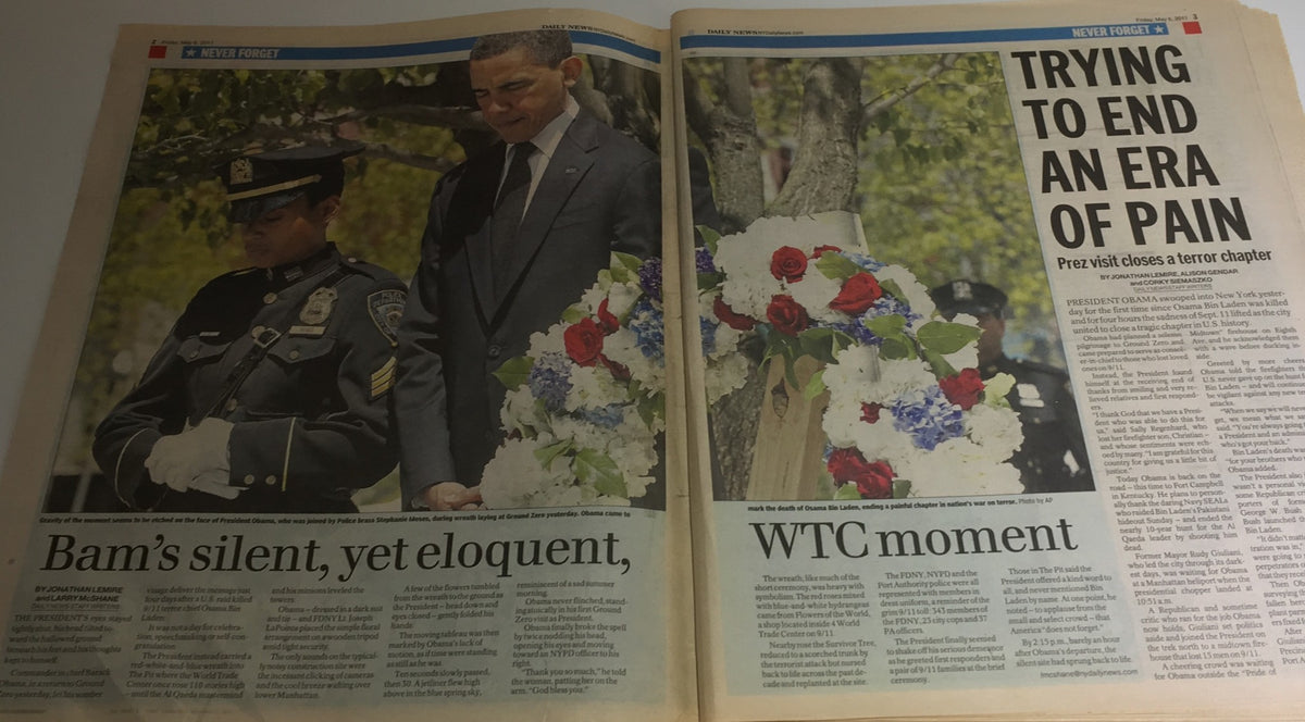 Inside pages of NY Daily News covering President Obama's visit to Ground Zero on May 6, 2011, with the title 'Trying to end an era of pain' and images of a police officer and Obama by a memorial wreath.