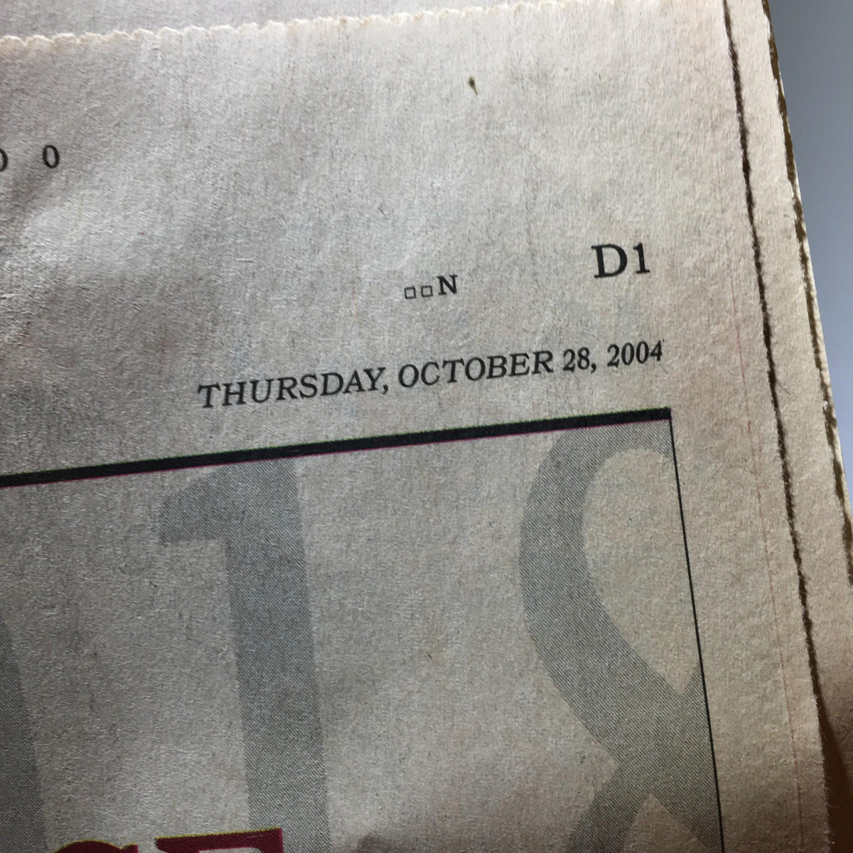 Top corner of The New York Times issue from October 28, 2004, showcasing the date and issue page D1.