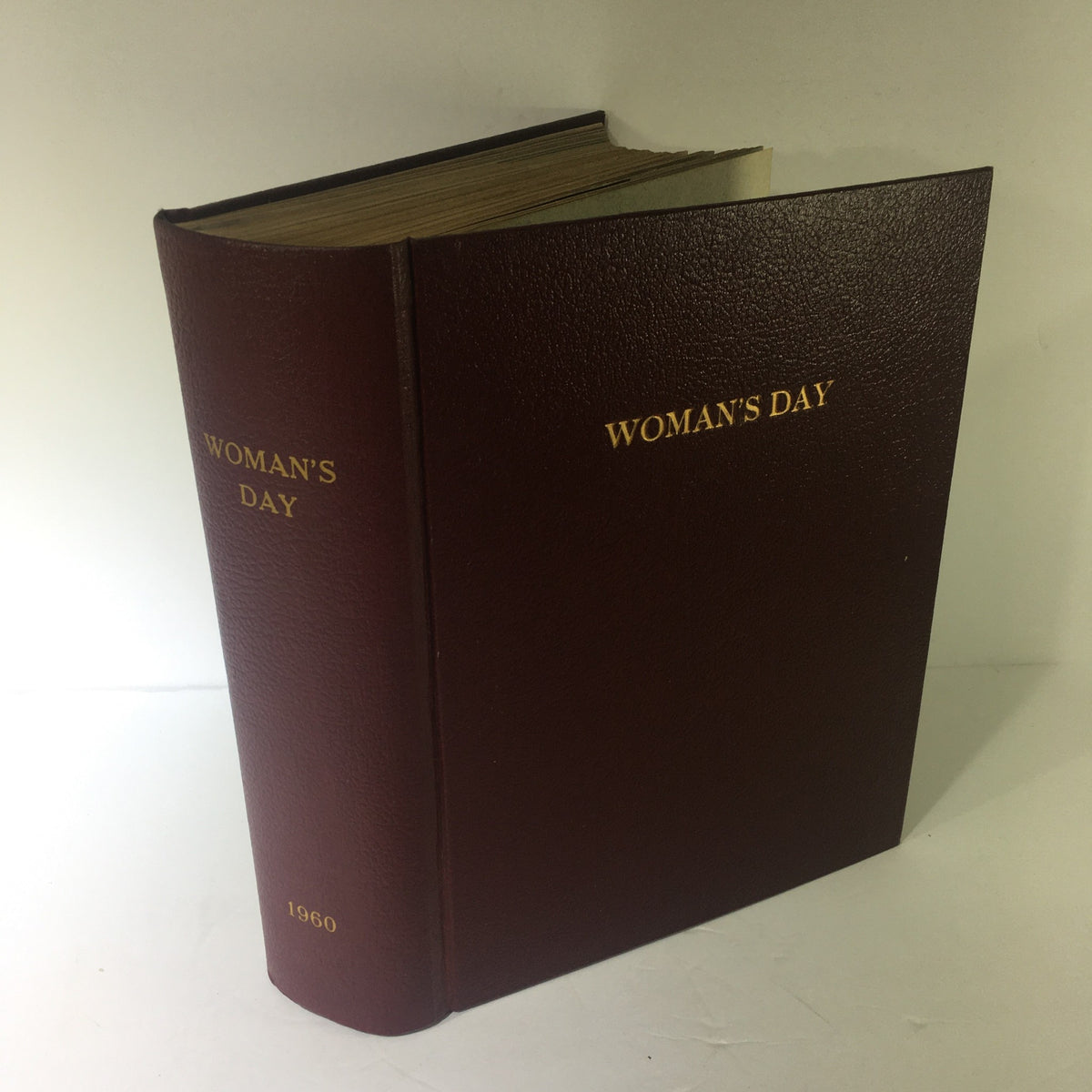 1960 Woman's Day Magazine Compilation hardcover book showcasing the title on the spine.