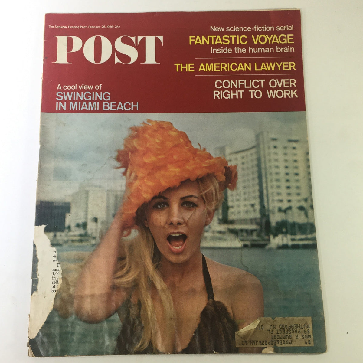 Cover of VTG The Saturday Evening Post February 26, 1966 featuring the headline 'Fantastic Voyage' with an image of a woman wearing an orange hat by a waterfront.
