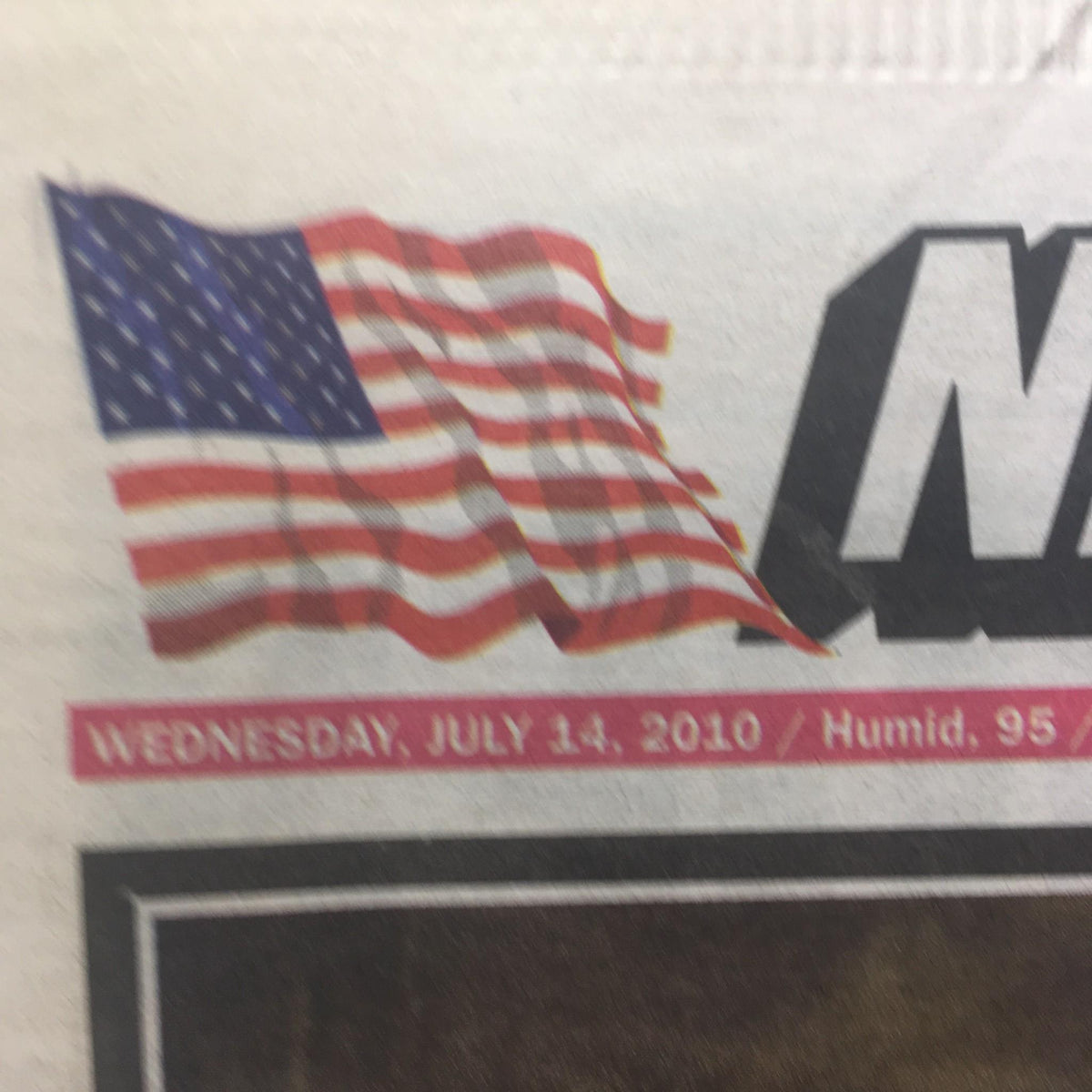 Top corner of the New York Post dated July 14, 2010, showcasing the American flag and the date, marking the tribute to George Steinbrenner.
