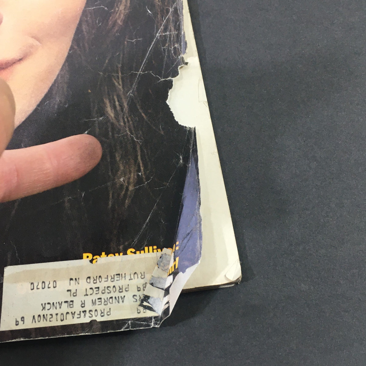 Close-up of the edge of the VTG Journal Magazine March 1969 cover, revealing peeling and wear that adds vintage character to the magazine.