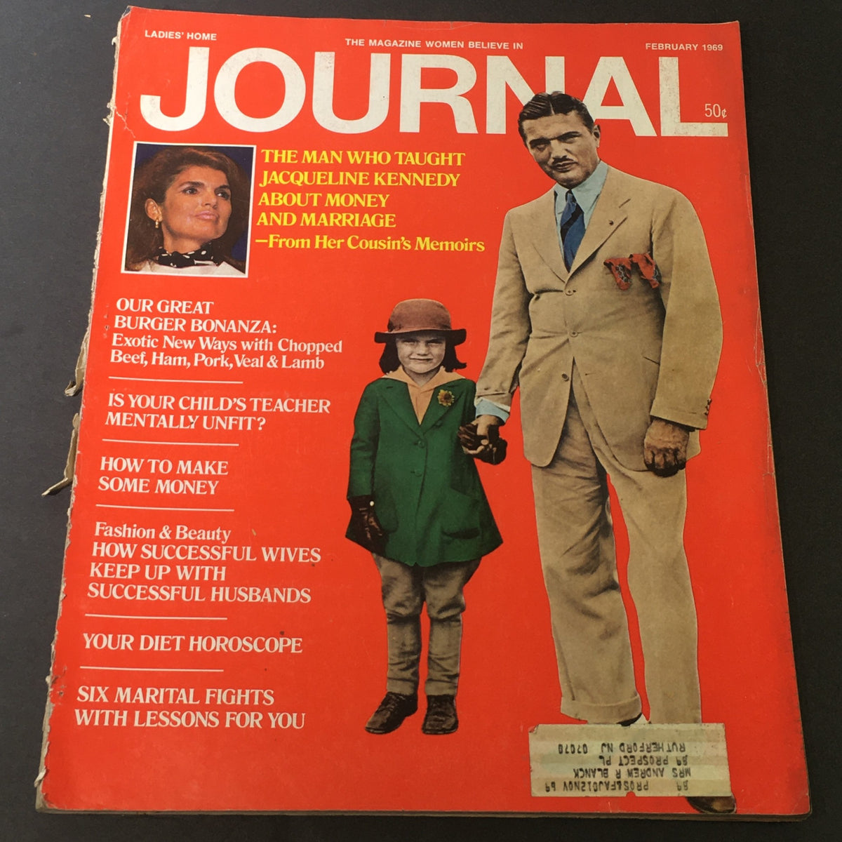 Cover of the VTG Journal Magazine February 1969 featuring Jacqueline Kennedy and a child, showcasing articles on money, marriage, and the Great Burger Bonanza.