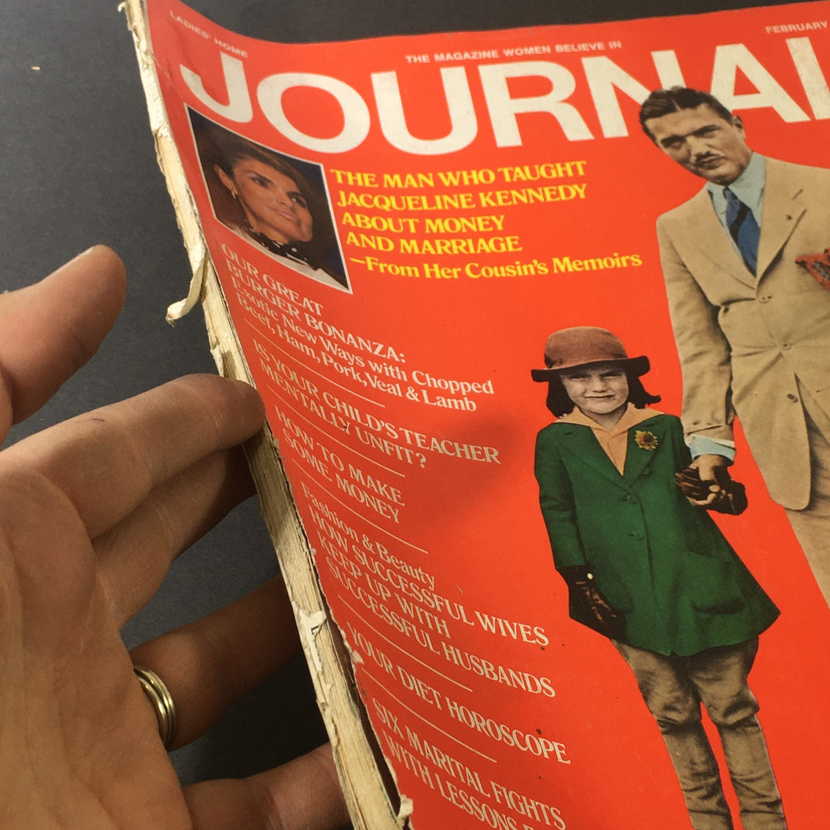 Close-up view of the VTG Journal Magazine February 1969 cover depicting Jacqueline Kennedy, emphasizing the magazine's content on financial advice and family topics.