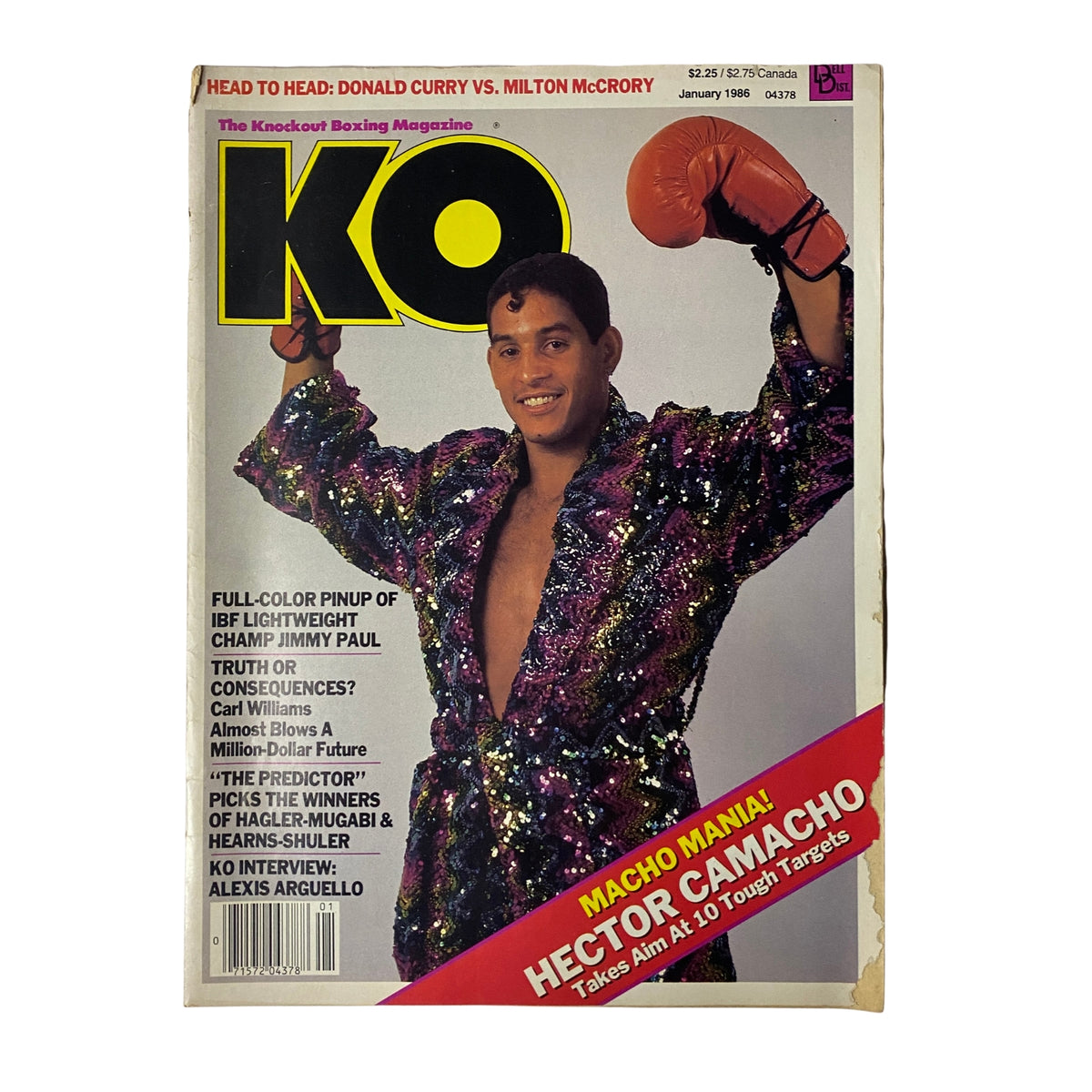KO Boxing Magazine January 1986 featuring Hector Camacho on the cover, showcasing his flamboyant style in a sparkly outfit. Highlights include articles on boxing legends, expert analysis, and the rise of Camacho as a boxing personality.