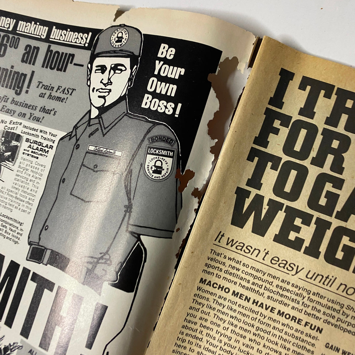 Inside page of KO Boxing Magazine May 1986 with a damaged advertisement, promoting locksmith training, emphasizing the financial opportunities of becoming your own boss.