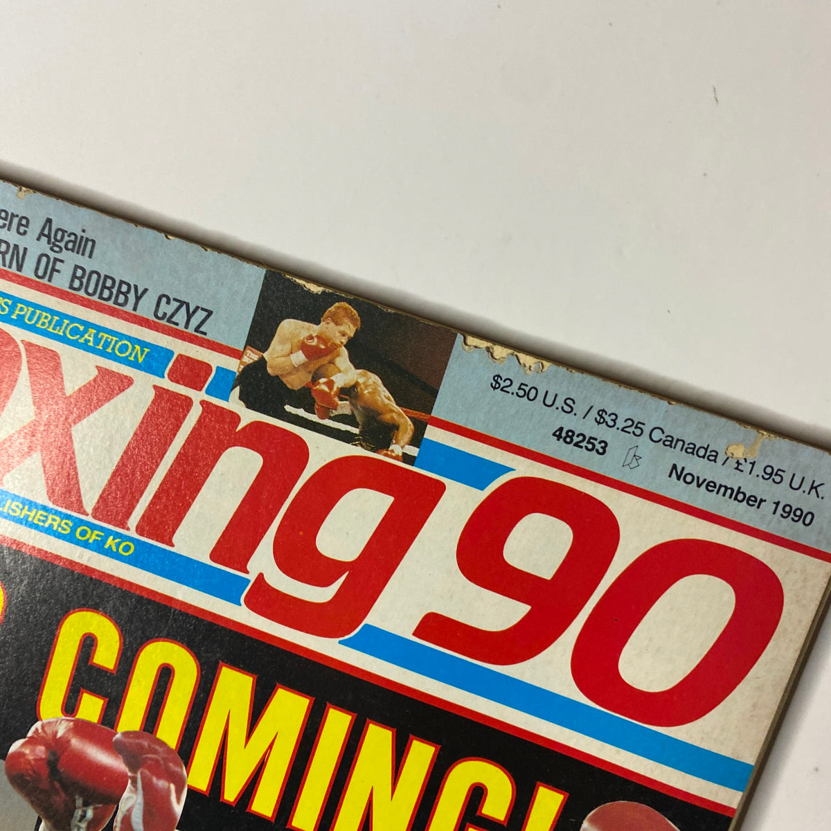 Cover of Boxing 90 Magazine, November 1990, featuring Mike Tyson and Donald Curry, including issue details and pricing.