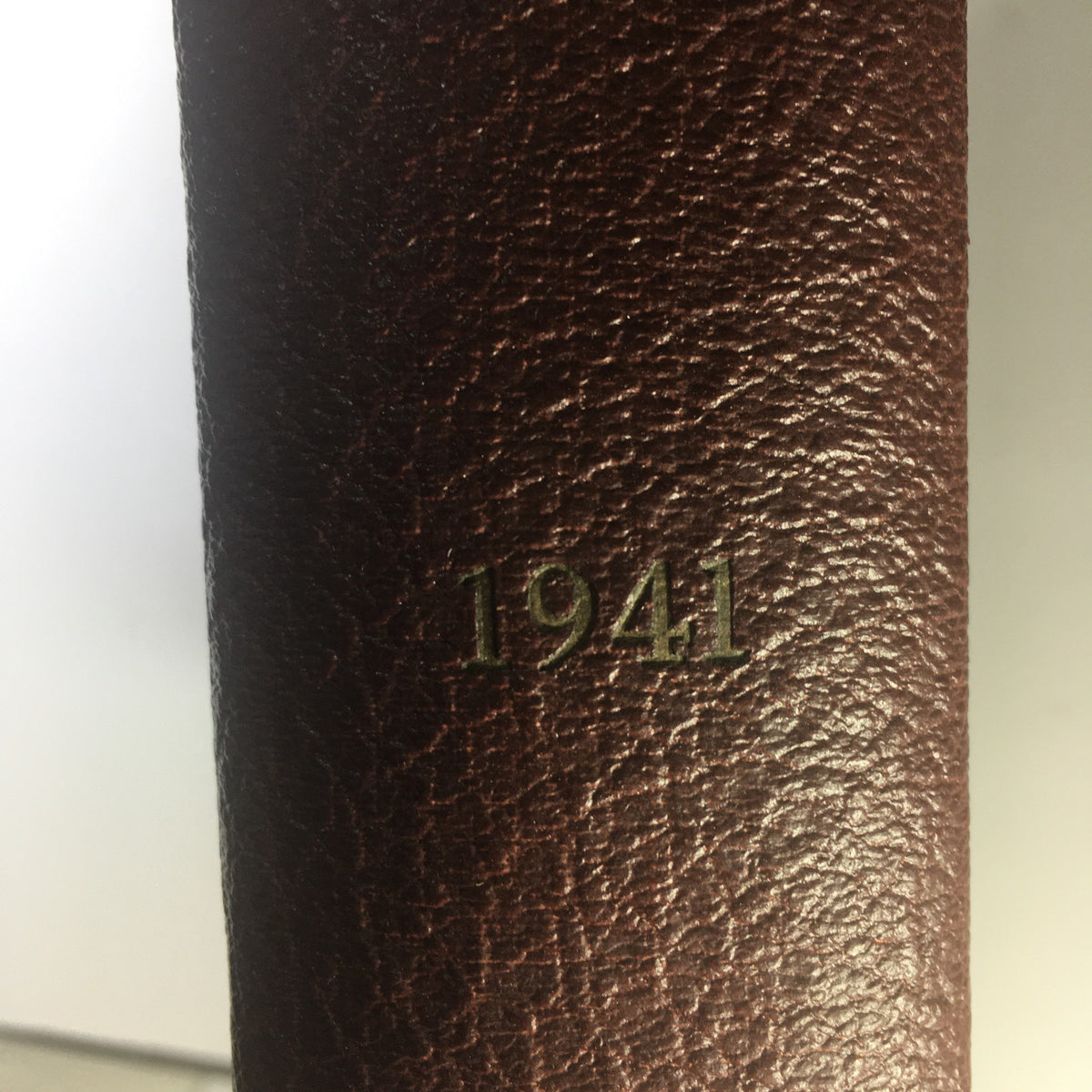 1941 Woman's Day Magazine Compilation with brown textured cover showing the embossed year 1941.
