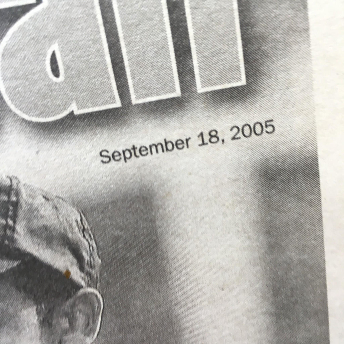 Close-up of the date on the NY Daily News newspaper, September 18, 2005, related to 'Viva Baseball 21' honoring Roberto Clemente.