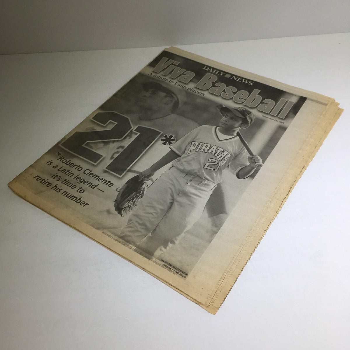 Another view of the NY Daily News from September 18, 2005, highlighting 'Viva Baseball 21' and Roberto Clemente, with an illustration of the player.