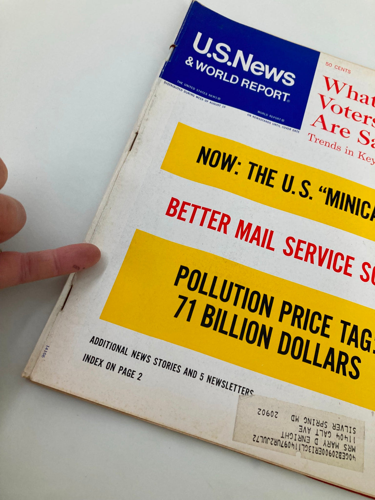 Close-up of the cover of US News & World Report Magazine from August 17, 1970, highlighting the title 'What Voters Are Saying' along with key issues like pollution costs and mail service.