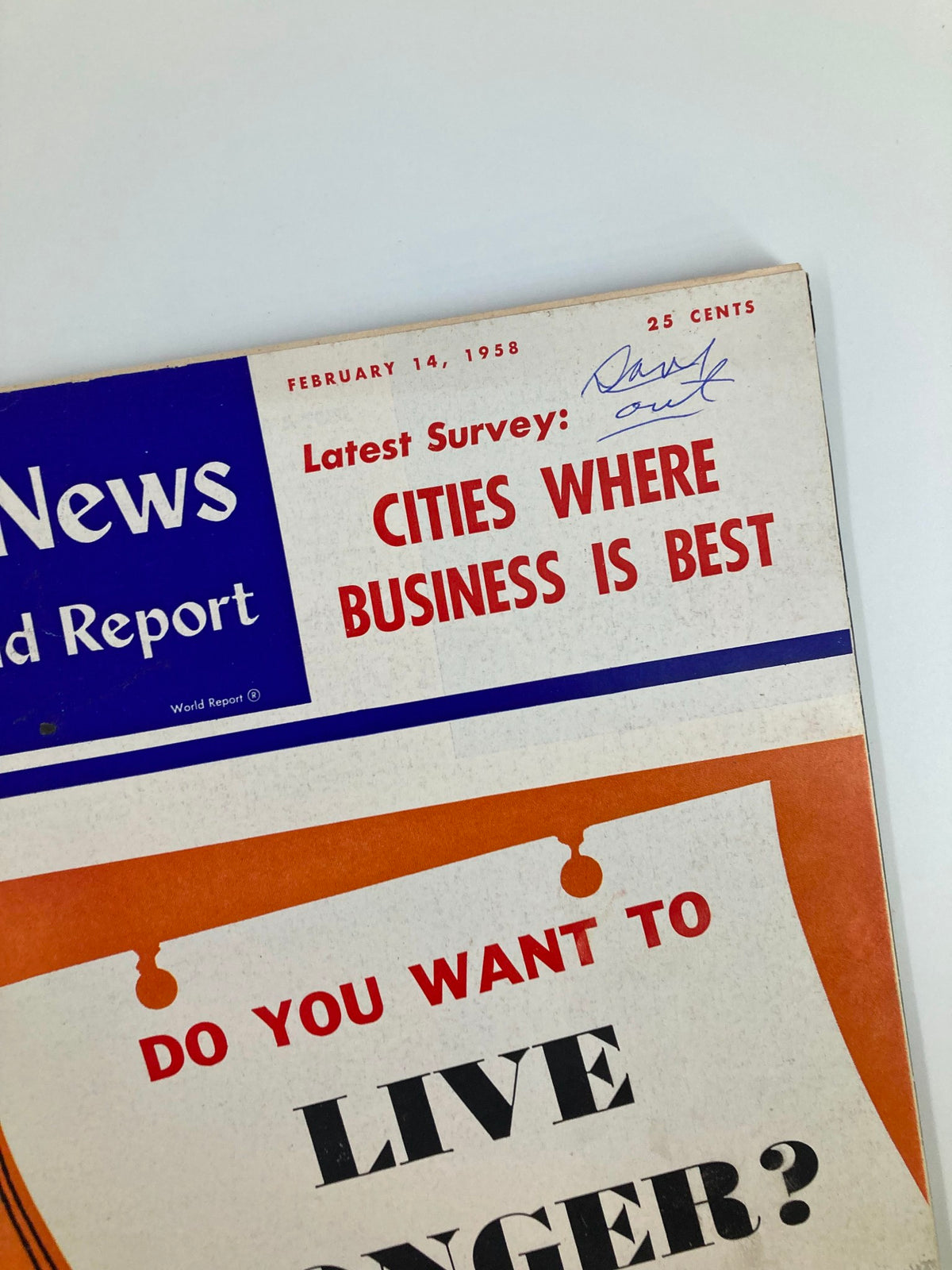Close-up view of the front cover of US News & World Report Magazine, dated February 14, 1958, highlighting 'Cities Where Business is Best' and the question 'Do You Want to Live Longer?'