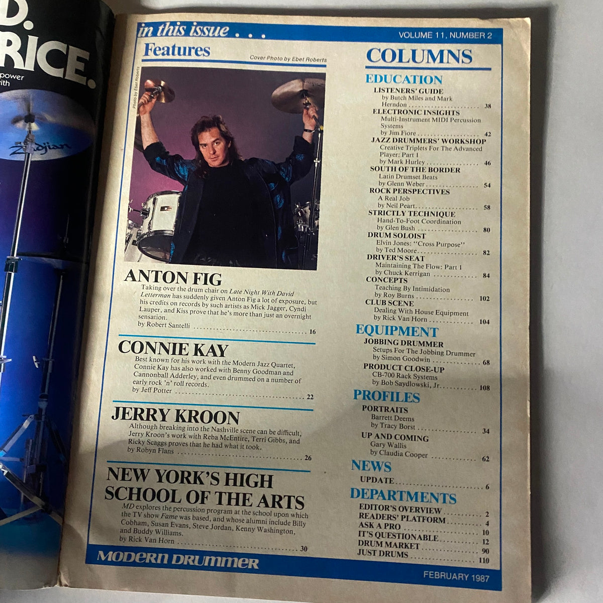 Inside page of VTG Modern Drummer Magazine February 1987 Vol 11 No. 2 featuring Anton Fig with a drum, highlighting key articles and features.