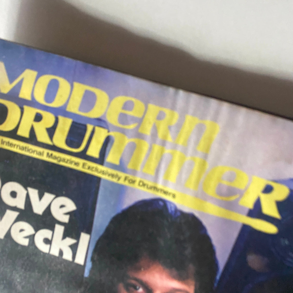 Close-up image of the Modern Drummer Magazine title and Dave Weckl's name on the cover from October 1986.