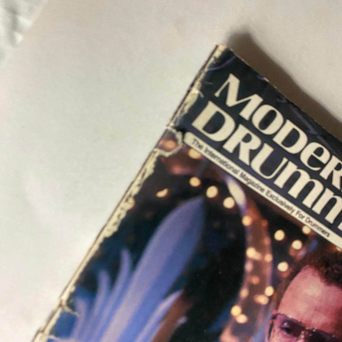 Close-up image of the Modern Drummer April 1986 magazine cover featuring Ed Shaughnessy, displaying vintage design details.