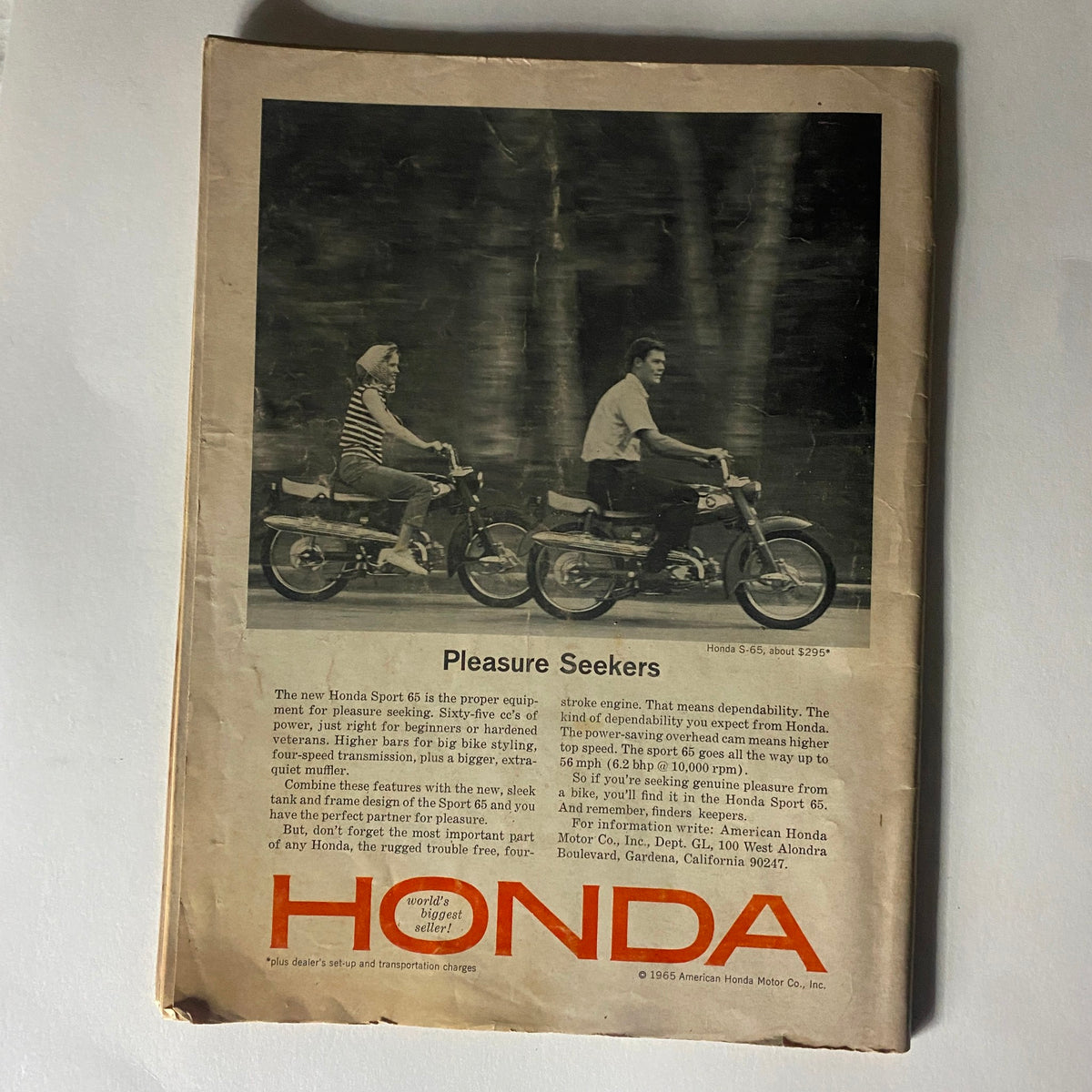 Back cover of VTG Cycle World Magazine July 1965, advertising the Honda Sport 65 motorcycle, emphasizing its features for pleasure seekers.