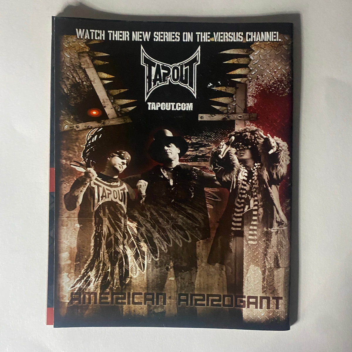 Back cover of Extreme Fighter Magazine 2008 #02 displaying a Tapout advertisement, promoting their new series on the Versus channel with a striking visual design.