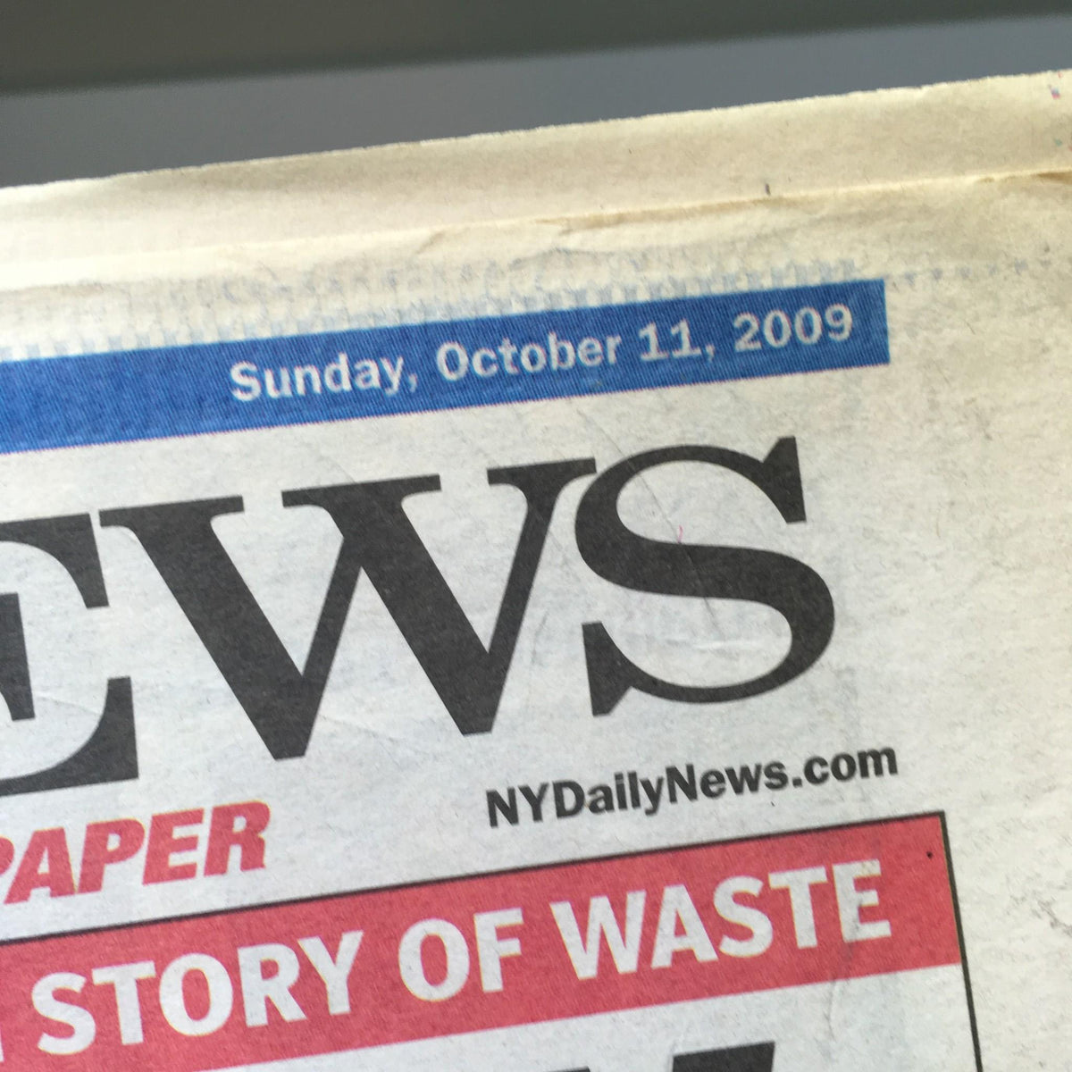 NY Daily News dated Sunday, October 11, 2009, showcasing the date prominently on the newspaper.