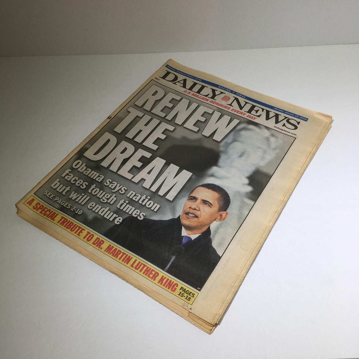 NY Daily News cover from January 19, 2009, with the headline 'RENEW THE DREAM' and an image of President Obama delivering a speech.