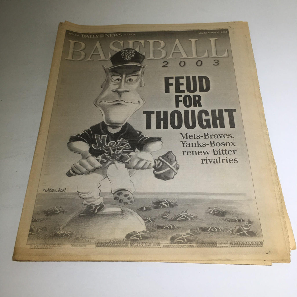 New York Daily News from March 31 2003 featuring the title 'Feud For Thought' with a caricature of a baseball player, discussing Mets-Braves and Yankees-Red Sox rivalries.