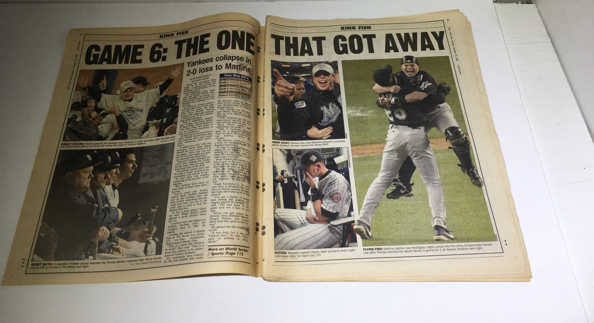 Inside pages of the New York Post, highlighting article 'Game 6: The One That Got Away' with coverage of the Marlins' victory over the Yankees, under the title 'King Fish'.