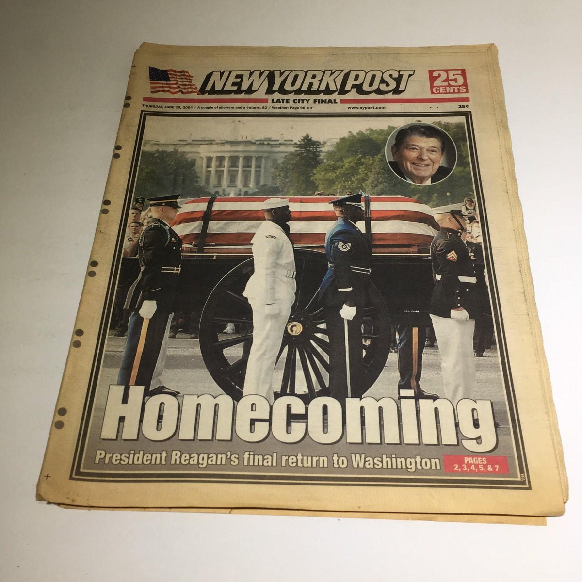 New York Post: 06/10/04, Homecoming, President Reagan's final return to Washington featuring a military honor guard and the flag-draped casket.